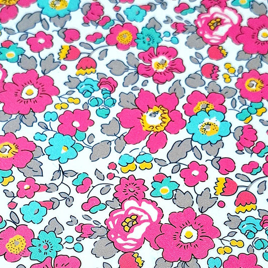 Estampado Liberty en flores rosa fucsia y azul turquesa