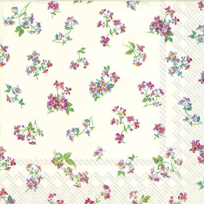 "Estampado de pequeñas flores silvestres en tonos morados, azules y naranjas con hojas verdes, distribuidas de forma dispersa sobre fondo blanco crema"