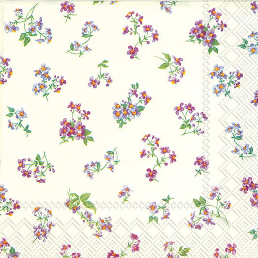 "Estampado de pequeñas flores silvestres en tonos morados, azules y naranjas con hojas verdes, distribuidas de forma dispersa sobre fondo blanco crema"