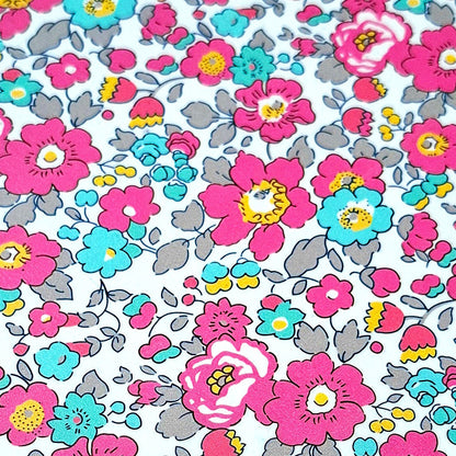 Estampado Liberty en flores rosa fucsia y azul turquesa