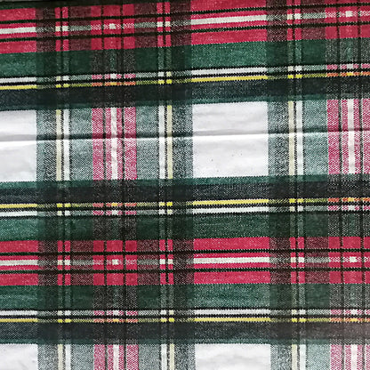Patrón de cuadros escoceses en tonos verde, rojo y beige.